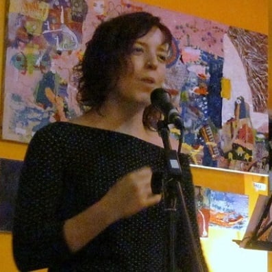 Luna Allison at a poetry reading - 397x397px